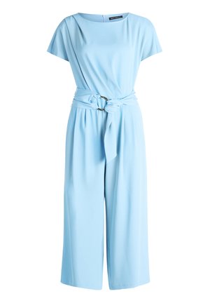Light blue short-sleeve wide-leg jumpsuit with round neckline and self-tie belt featuring a circular metal buckle at the waist.