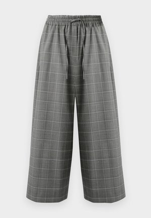 Pantalons larges à carreaux gris avec une taille élastique et un cordon de serrage. Présente un motif à carreaux avec une texture subtile.