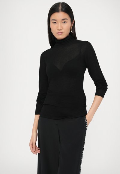 Czarny sweter z golfem i długimi rękawami, wykonany z przejrzystego materiału. Posiada dopasowany krój z subtelnym detalem w kształcie serca na piersi.