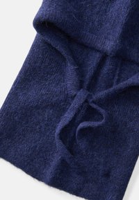 Navy-blue knitted fabric with a soft, textured surface. Includes a tied closure and folded edge detail, showcasing a cozy design.