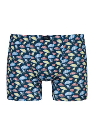 Boxershorts mit einem marineblauen Hintergrund und einem wiederholten Muster bunter Strandsonnenschirme in Gelb, Blau und Rot gestreift.
