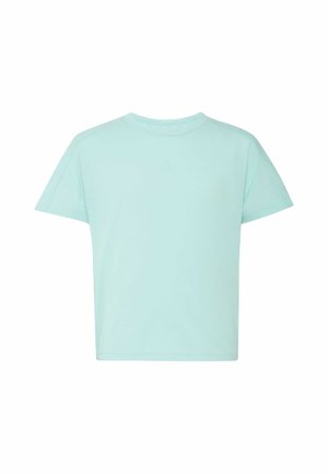 Camiseta de manga corta color azul claro con cuello redondo y corte holgado, mostrada sobre un fondo blanco liso.