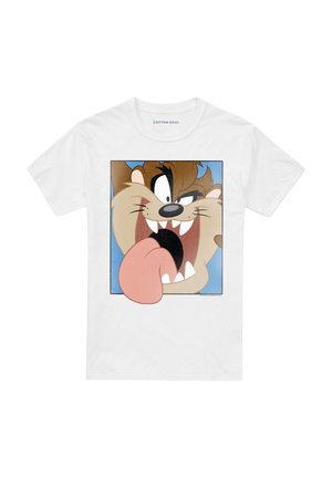 White T-shirt featuring a cartoon character with brown fur, wide eyes, sharp teeth, and tongue sticking out against a blue background.