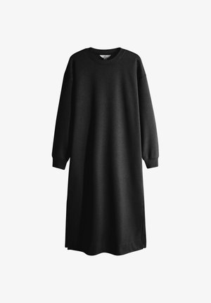 Długa czarna sukienka-blejzer z długimi rękawami, okrągłym dekoltem i ściśniętymi mankietami, wyeksponowana na białym tle.