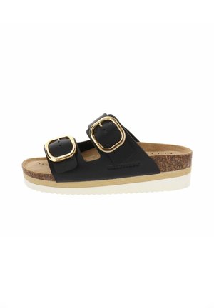 Sandale noire à enfiler avec deux grandes boucles dorées, semelle intérieure en liège et semelle blanche à rainures, conçue pour un usage décontracté.