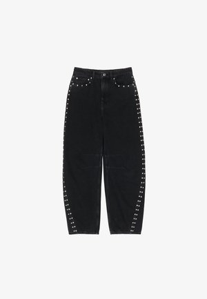 Black denim jeans with a relaxed fit, featuring silver studs along the side seams and two front pockets.