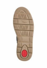 Semelle de chaussure en matériau caoutchouteux beige avec un motif de grip texturé, des designs triangulaires et un accent circulaire rouge étiqueté "confort".
