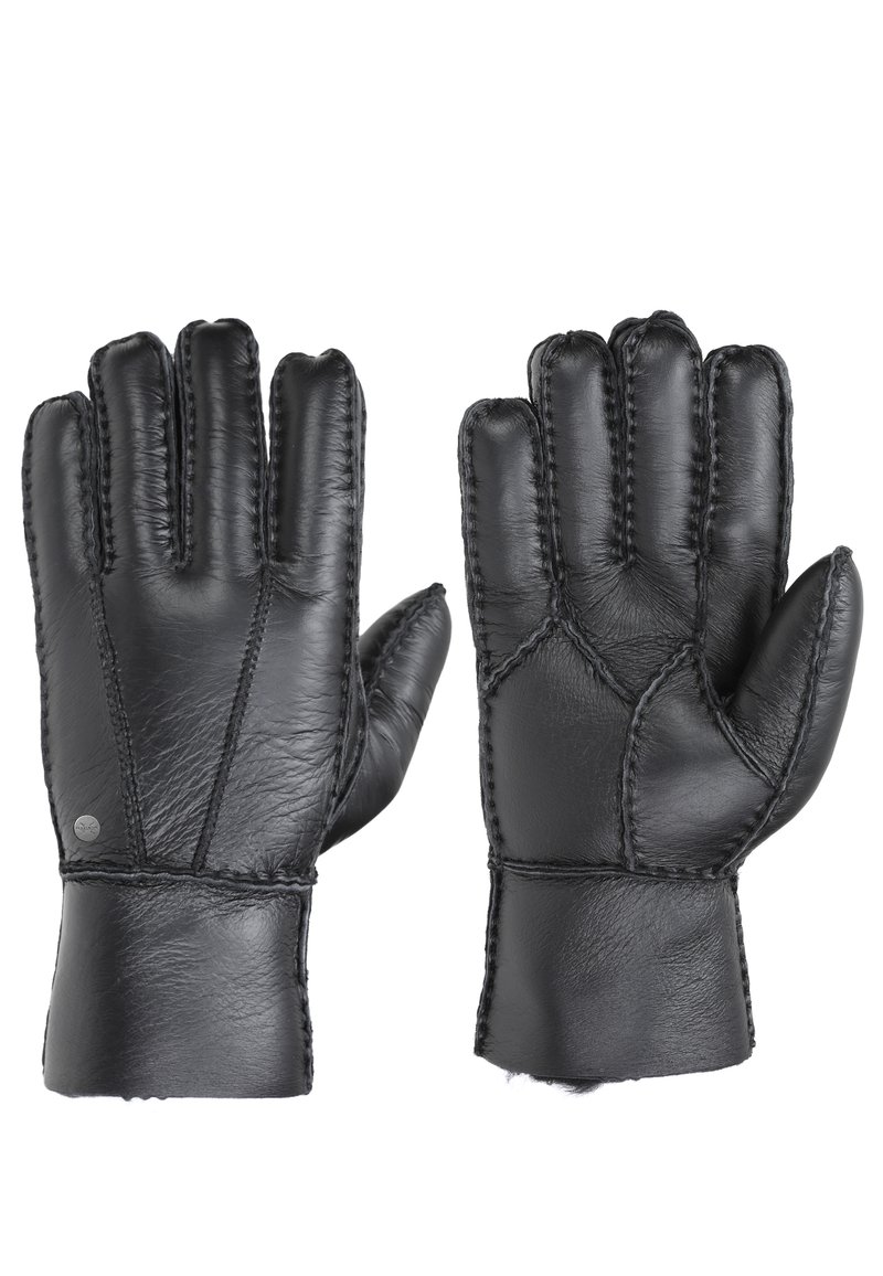 Juodos odinės pirštinės su glotnia tekstūra, turinčios kontrastingas siūles ir prigludusią tinkamą formą. Atvirų pirštų dizainas suteikia lankstumo.
