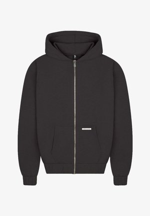 Black zip-up hoodie with a front pocket, ribbed cuffs, and hem. Features a drawstring hood and a small label on the left pocket.