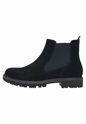 Bottine chelsea en suède noir avec des panneaux latéraux élastiques texturés, semelle en caoutchouc robuste et détails de couture contrastés.