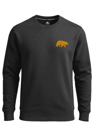 Schwarzes Sweatshirt mit langen Ärmeln, gerippten Bündchen und Saum, mit einer kleinen orangen Bären-Silhouette auf der linken Brustseite. Weicher Stoff.