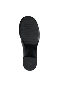 Semelle en caoutchouc noir avec un motif de grip texturé, présentant une forme ovale et un logo de marque en relief, conçu pour une traction améliorée.
