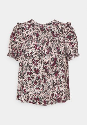 Blouse met korte mouwen met een bloemenpatroon in roze, wit, zwart en donkerrood, met ruches op de schouders en mouwen.