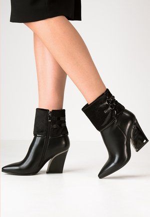 Bottines à talons hauts - black