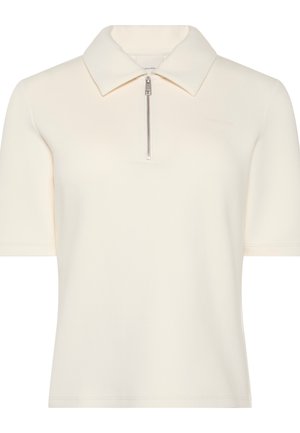 Tricou polo crem cu mâneci scurte, cu fermoar argintiu în față și guler clasic.