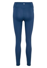 Granatowe legginsy wykonane z elastycznej tkaniny, z wysokim stanem i bezszwowym tyłem. Minimalistyczne logo w okolicy pasa.