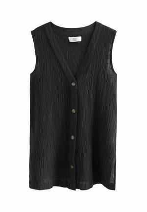 Blouse noire texturée sans manches avec col en V et quatre boutons foncés sur le devant, présentée sur fond blanc.