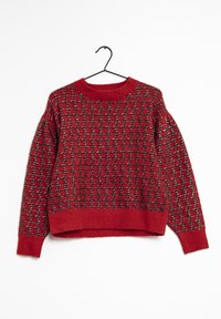 Rød strikket sweater med et tekstureret mønster og ribbet halsudskæring og kant. Lange, løse ærmer med design der er cropped.