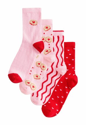 Four pairs of socks in pink and red. Features heart-shaped cookie designs, wave patterns, and small hearts. Textured knit and contrasting accents.