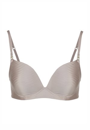 Beige geribbelde beha met beugel, licht gevoerde cups, verstelbare bandjes en sluiting met haakjes. Soepele textuur, die een gestroomlijnde vorm biedt.