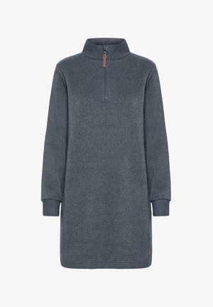 Robe pull grise avec un col haut, fermeture éclair frontale mi-haute, manches longues et poignets côtelés. Présente un petit logo sur l'ourlet. Texture de tissu douce.