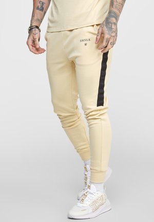 Teplákové kalhoty - beige