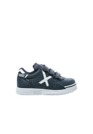Dark blue sneaker with velcro straps, perforated texture, white accents, and a rubber sole featuring a contrasting stripe. Brand logo visible.