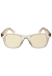 Prozirne oversized sunčane naočale sa četvrtastim staklima, svijetlosmeškim nijansama stakala i debelim prozirnim okvirom od acetata.
