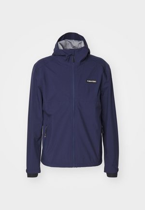 Calvin Klein Golf FEATHER DRY WATERPROOF SHELL JACKET - Veste imperméable - navy
