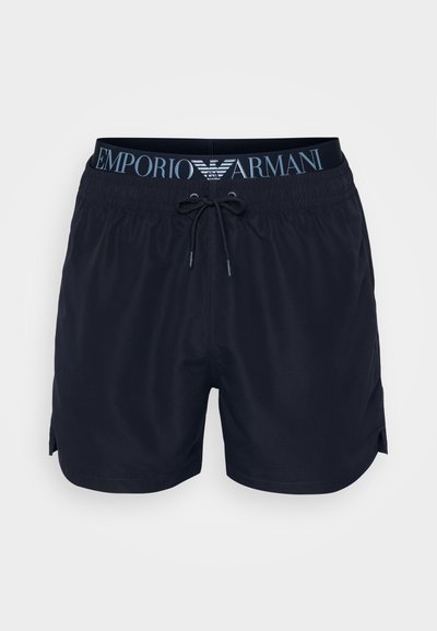 Jūriniai maudymosi šortai su elastingu juosmeniu, turintys raištelį, šonines įpjovas ir kontrastingos mėlynos spalvos "Emporio Armani" logotipą.