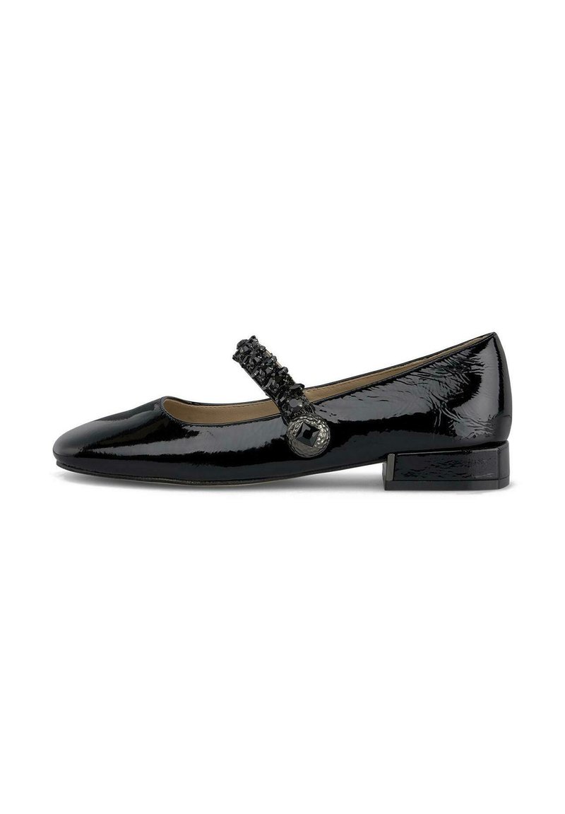 Chaussure Mary Jane en cuir verni noir avec un bout arrondi, un petit talon block et une sangle décorative comportant des détails texturés noirs et des accents.