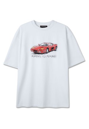 White T-shirt with a red sports car sketch and the text "MOMENTS TO MEMORIES" printed below the car design.