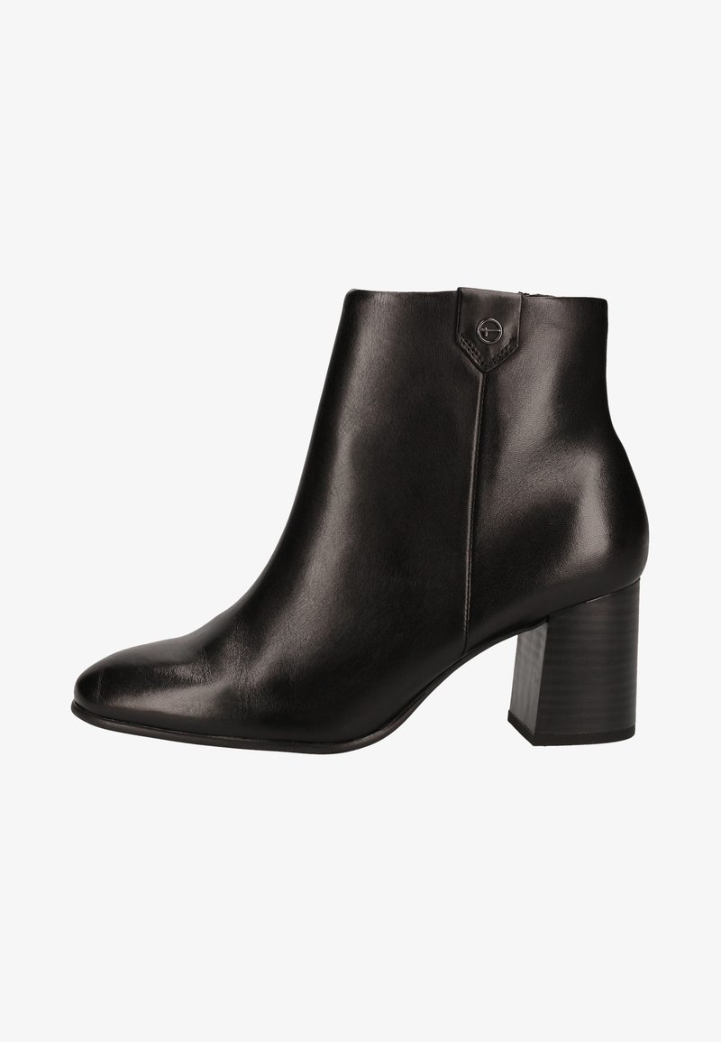 Bottine en cuir noir avec un bout pointu, des coutures apparentes, une fermeture éclair latérale et un talon bloc. Texture lisse avec une finition brillante.