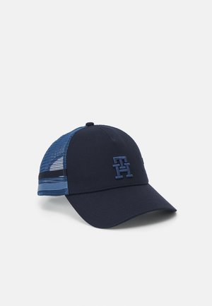 Casquette de baseball bleu marine avec panneaux arrière en maille, visière incurvée et logo "TH" entrelacé brodé à l'avant.