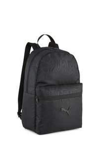 Mochila de nylon negra con un diseño texturizado, un bolsillo frontal con cremallera y un acento de logo. Cuenta con correas de hombro acolchadas y una silueta curva.