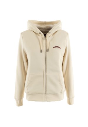 Kremowy hoodie zapinany na zamek, wykonany z miękkiego materiału, z wyściełanym kapturem, ściągaczami na mankietach oraz haftowanym logo w ciemnoczerwonym kolorze.