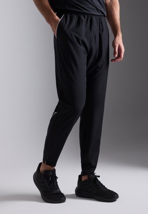 LEGGINGS - Pantalones deportivos - black