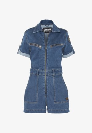 Mono de mezclilla con cremallera en el frente, mangas cortas, dos bolsillos en el pecho y cintura ajustada. El material tiene una textura y un tono azul clásico.