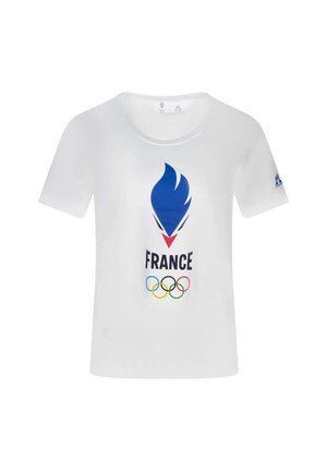 T-shirt blanc avec un graphisme de flamme bleue, "FRANCE" en texte noir en gras, et cinq anneaux olympiques colorés sous le texte.