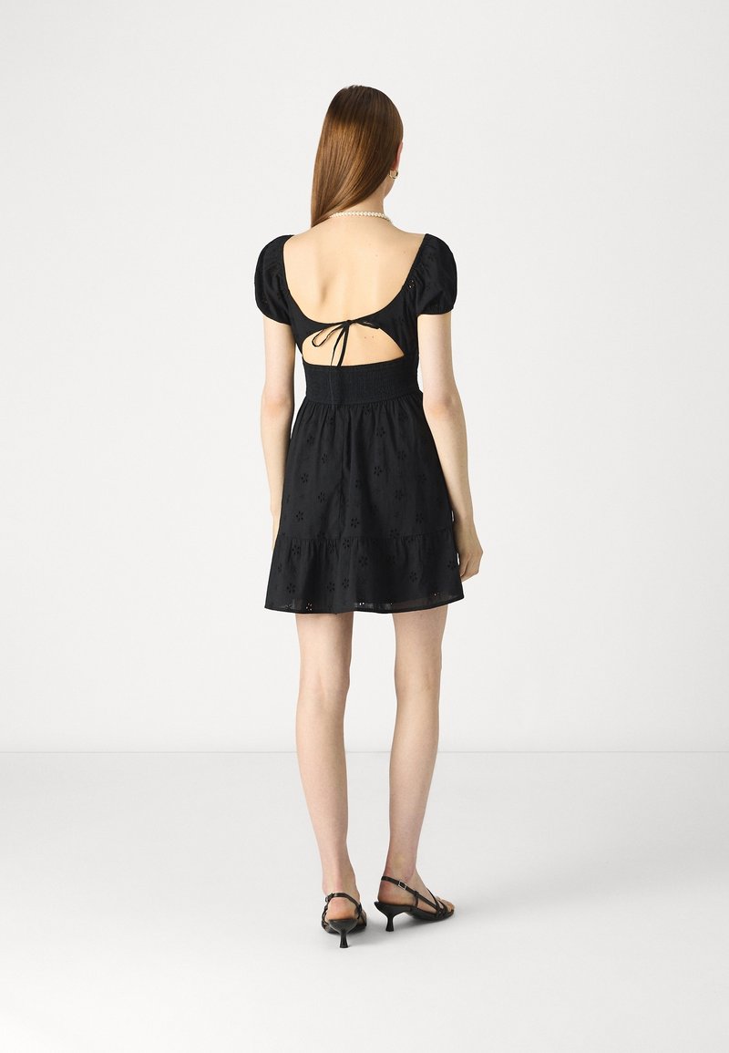 hollister black dress Babydoll - The delicate ruffle details add a feminine touch Hollister Co. Day dress -
