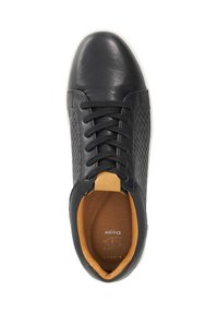 Black leather sneaker with textured sides, round toe, and black laces. Interior features a tan lining and logo detail. White rubber sole.