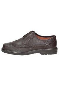 Scarpa da uomo in pelle marrone con dettagli brogue, punta rotonda e lacci marroni. Presenta una finitura texturizzata e una suola in gomma nera per una migliore aderenza.