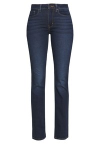 Mörkblå denimjeans med rak skärning, femficksdesign och dragkedja. Har subtil sömnad längs sömmarna och midjebandet.