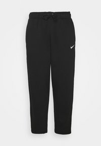 Svarta sweatpants i mjuk tyg, med elastisk midja och dragsko, avsmalnande ben och en liten vit Nike-logotyp på vänster höft.
