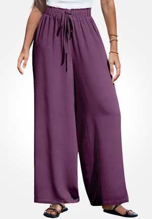 - Spodnie materiałowe