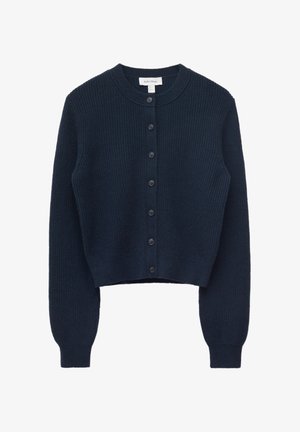 Tumma laivastonsininen ribbineulottu neuletakki, jossa on pitkät hihat, pyöreä pääntie ja etupuolella seitsemän napillinen kiinnitys.