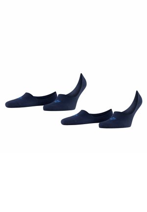 Chaussettes basses bleu marine avec une texture lisse et un design minimaliste. Équipées d'un petit logo sur la partie supérieure. Ajustement extensible qui épousent les chevilles.