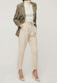 Trendyol Kalhoty - beige