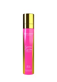 Satin Glow Tanning Dry Oil i en rosa och guld sprayflaska. Innehåller SPF 15, en icke-fet formula och ingredienser som Vitamin E och Arganolja.