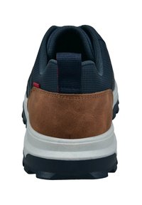 Navy mesh upper with brown leather heel, white midsole, and black rubber outsole. Features a looped pull tab at the back.